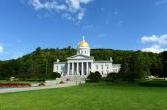 A photo of the Vermont State House in summer